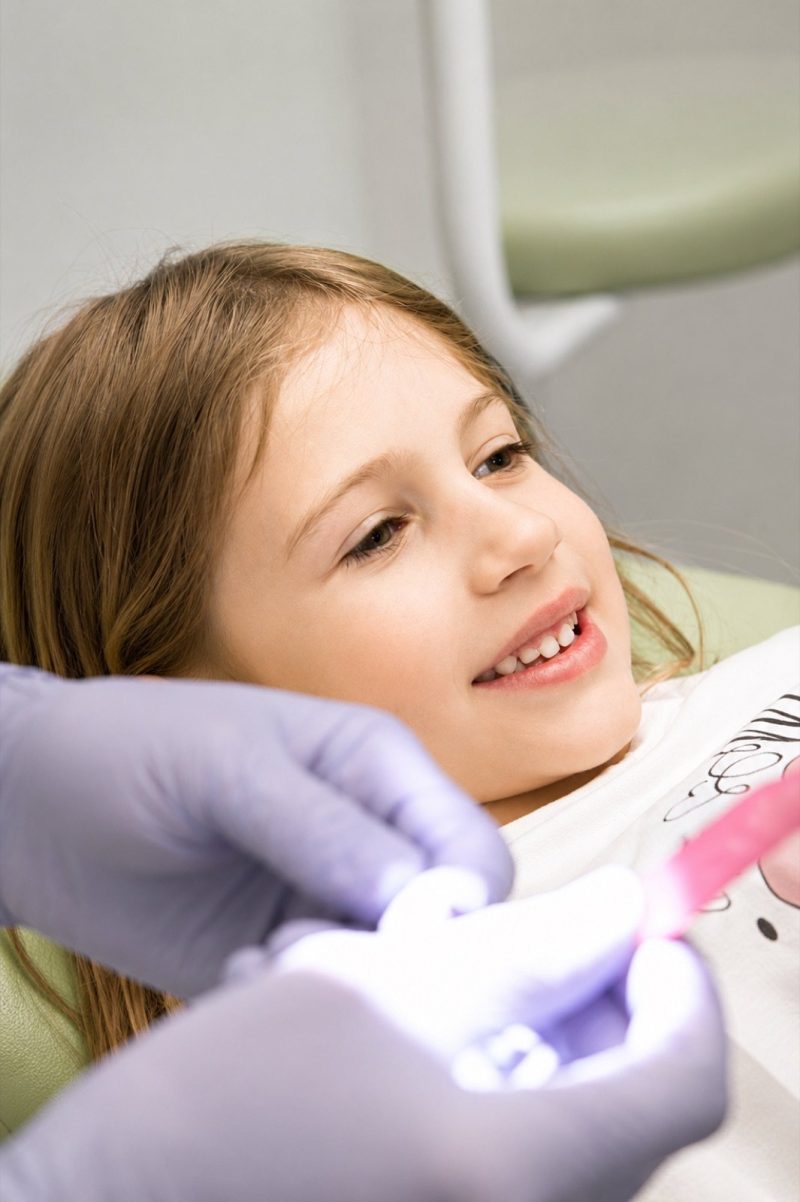 Child having an intraoral camera exam at Genesis Dental Centre